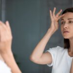 Woman Looking at Mirror
