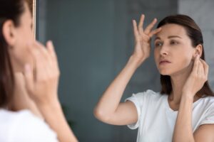 Woman Looking at Mirror